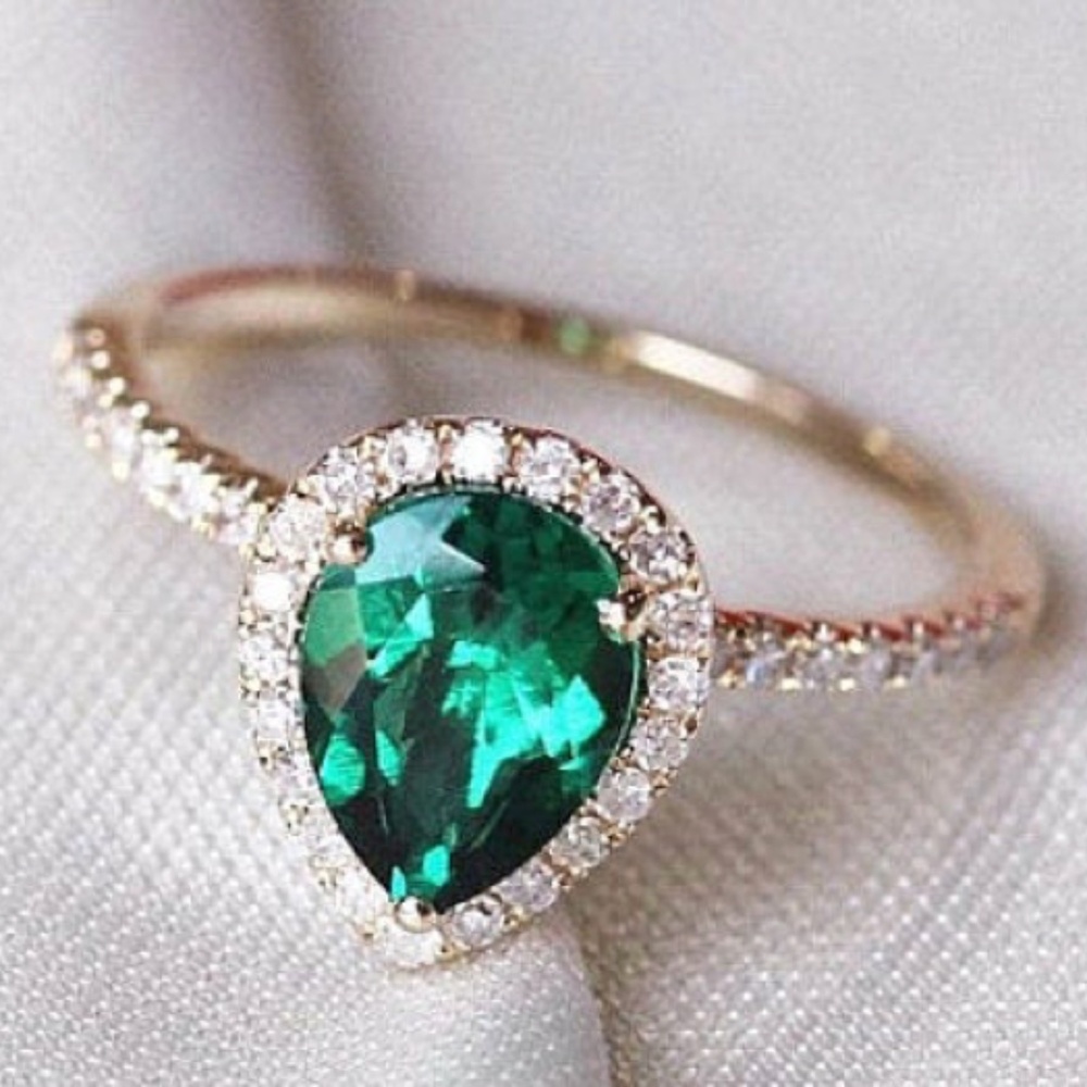 Custom 1.75 ct emerald pear ring in yellow gold
